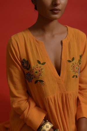 orange embroidered dress