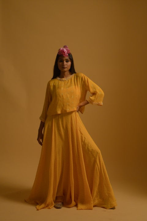 Yellow jumpsuit with pearl beaded cape