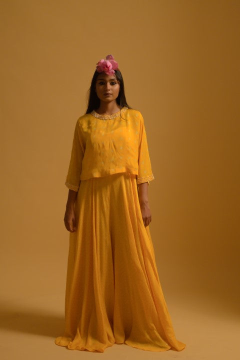 Yellow jumpsuit with pearl beaded cape