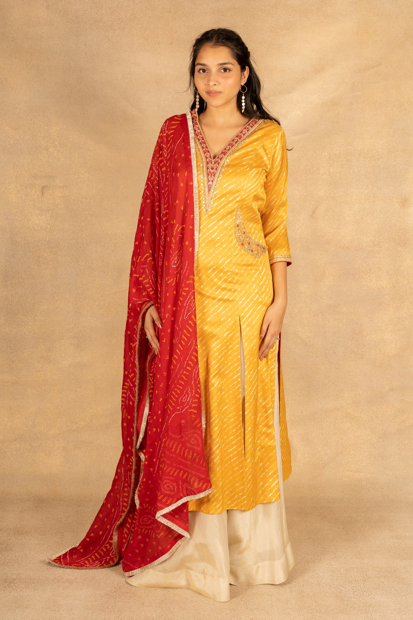 Yellow laheriya suit