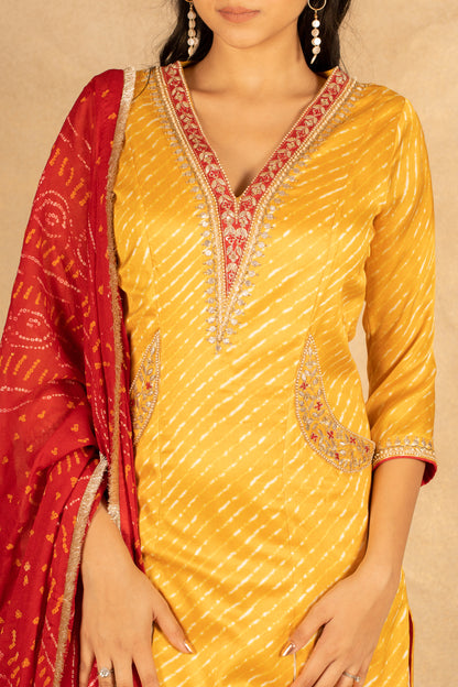 Yellow laheriya suit