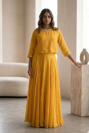 Yellow jumpsuit with pearl beaded cape